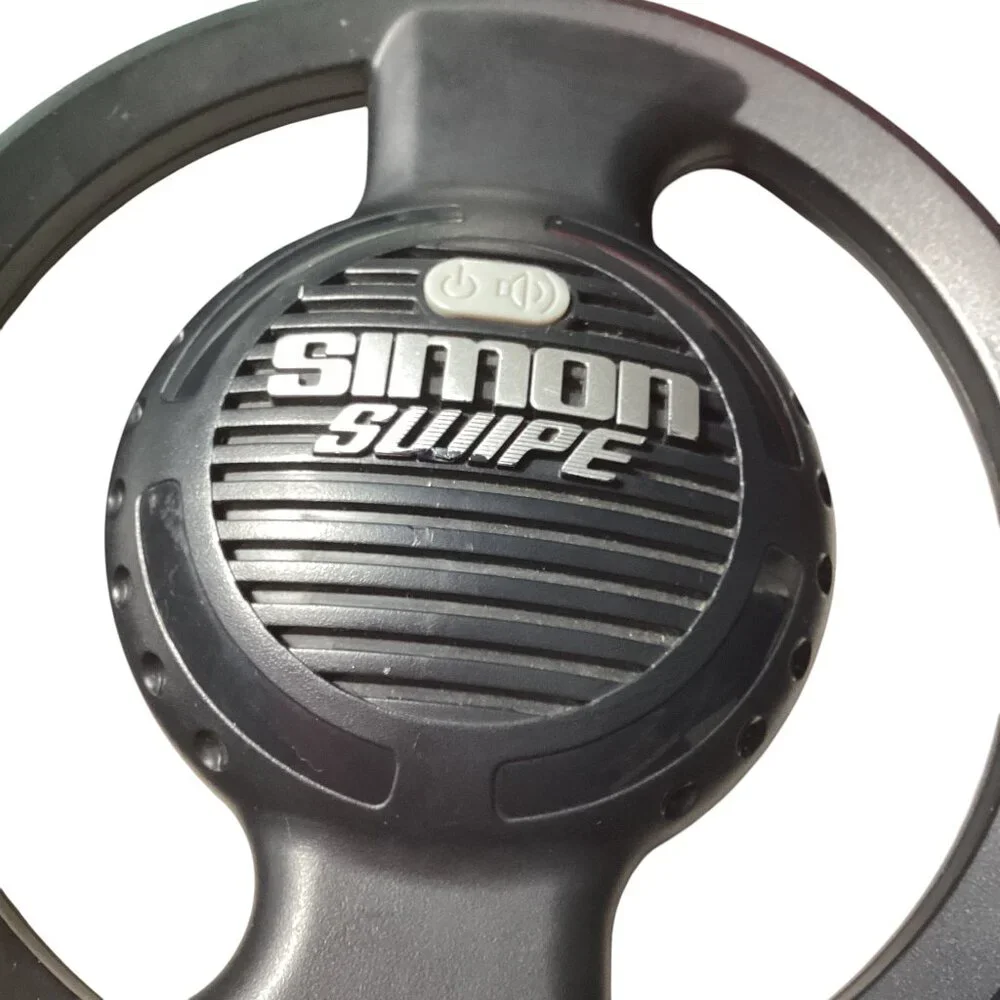 Hasbro: Simon Swipe, An Electronic Memory & Sequence Game, 2013